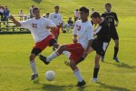 Liberty’s Dillon Cerullo and Juan Ramirez battle Fallsburg booters.