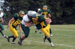 Eldred’s Shaun Berger tries to elude a tackle.