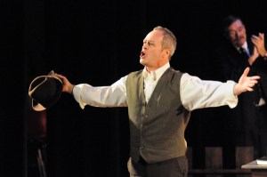 Kevin Confoy as E. K. Hornbeck, a newspaperman.