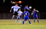 DSC_0534 Sullivan West’s Tyler Groh heads the ball toward the goal.