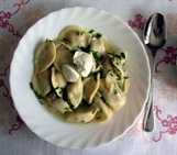 Russian Pelmeni with a dollop of sour cream