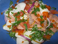 Ceviche with red onions, fish, and pink grapefruit