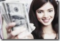 portrait-young-woman-holding-paper-currency
