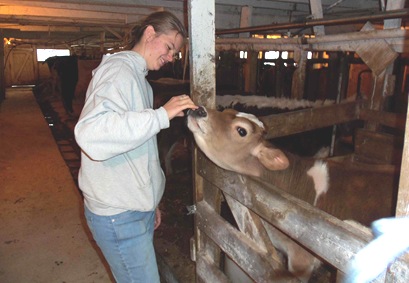 Fun Farm Animal of the Week: Serenity the Baby Cow enjoys a tender moment with her human friend, 18-year-old Chelsea Hardler, at Hardler Farms, near Honesdale, PA.