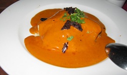 Duck zarape with roasted tomato-habanero cream sauce