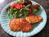 Corn fritters and salad greens