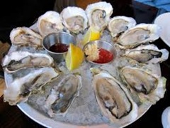 OysterswithtwosaucesatAquagrill